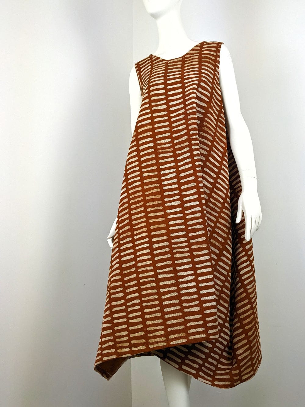 Beverly Smart SS25 sleeveless trapeze cut dress in Ndomo hand printed cotton mudcloth